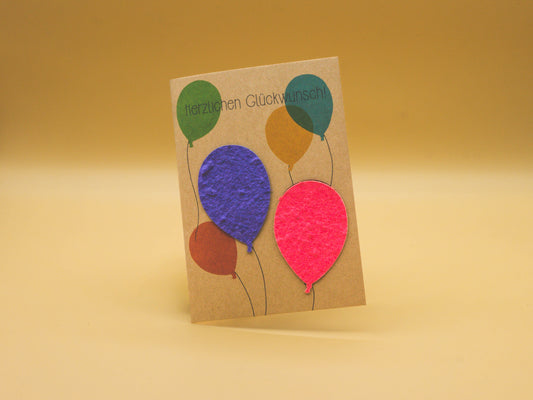 Carte de Voeux avec des Graines à planter dans les Ballons
